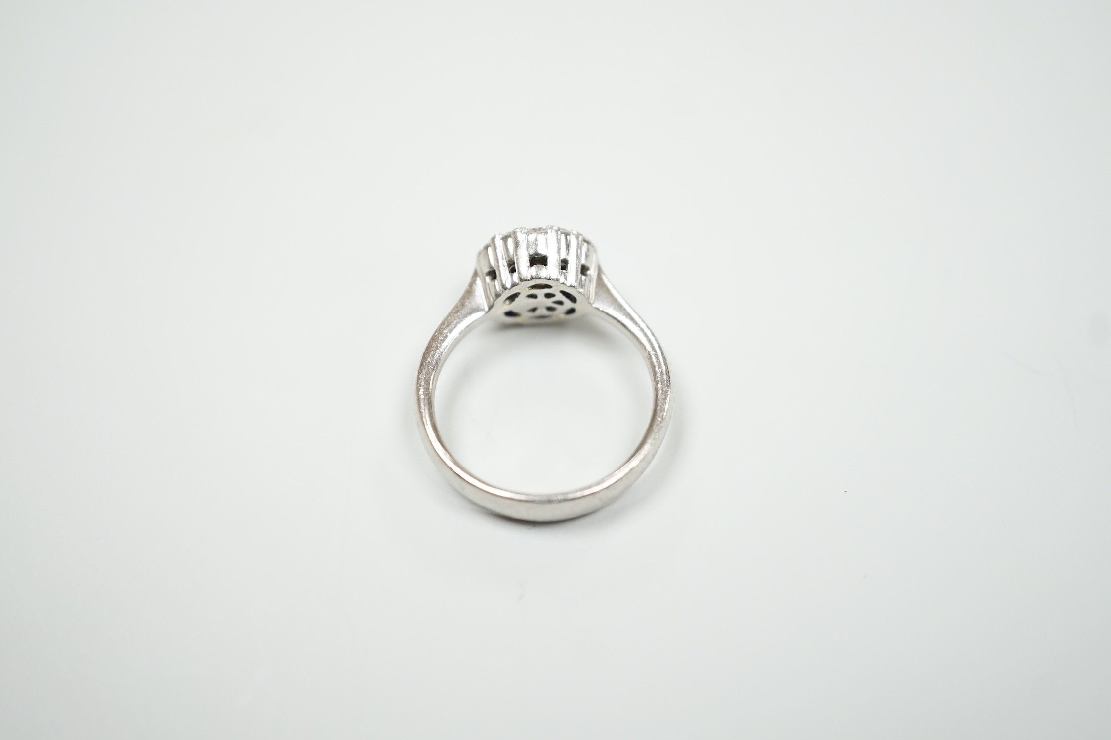 A modern Alito platinum and hexagonal cluster ring, size O, gross weight 8.4 grams.